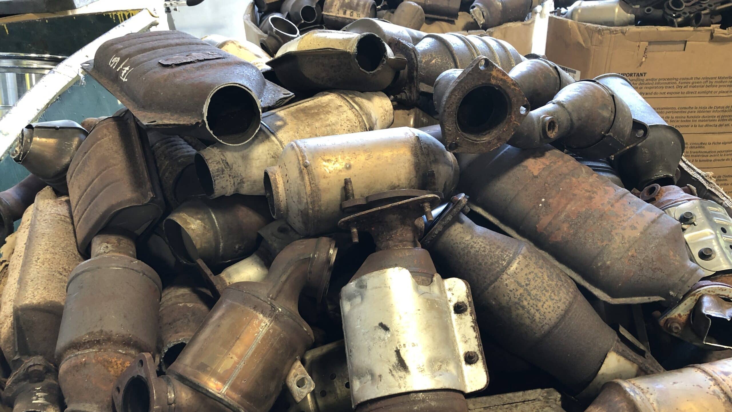 A pile of scrap catalytic converters awaiting collection